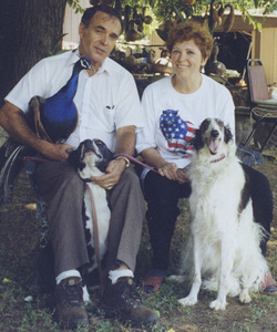 Dr. Jayna and Ted Costa with their dogs at home