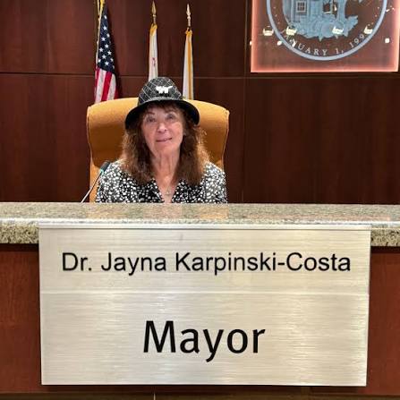 Dr. Jayna Karpinski-Costa seated at the dais as Mayor of Citrus Heights